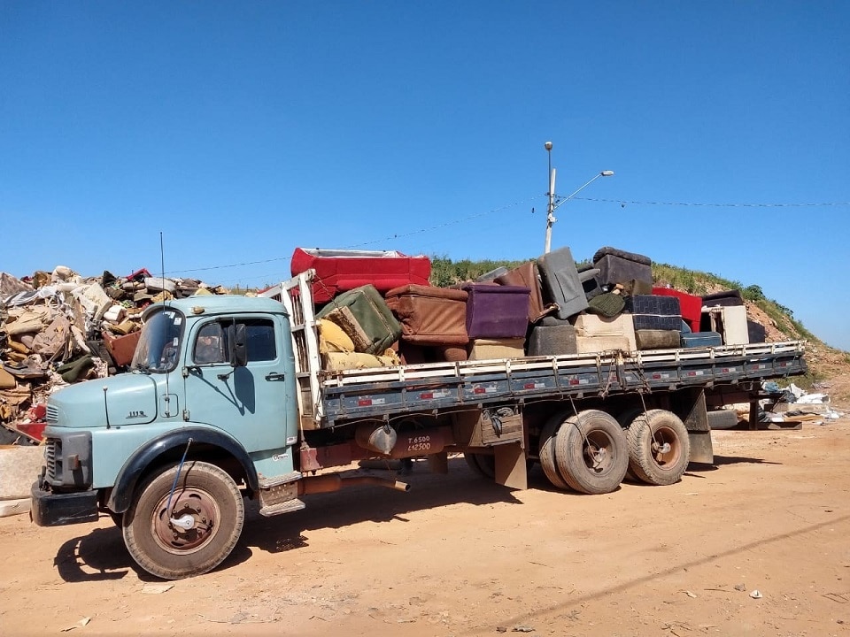 truck carrying furniture for recycle